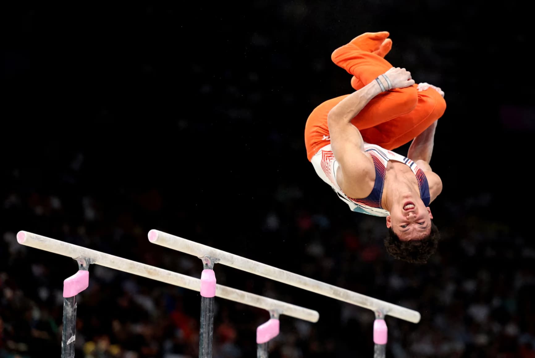 Dutch gymnast Jermain Gruenberg competes on the parallel bars.